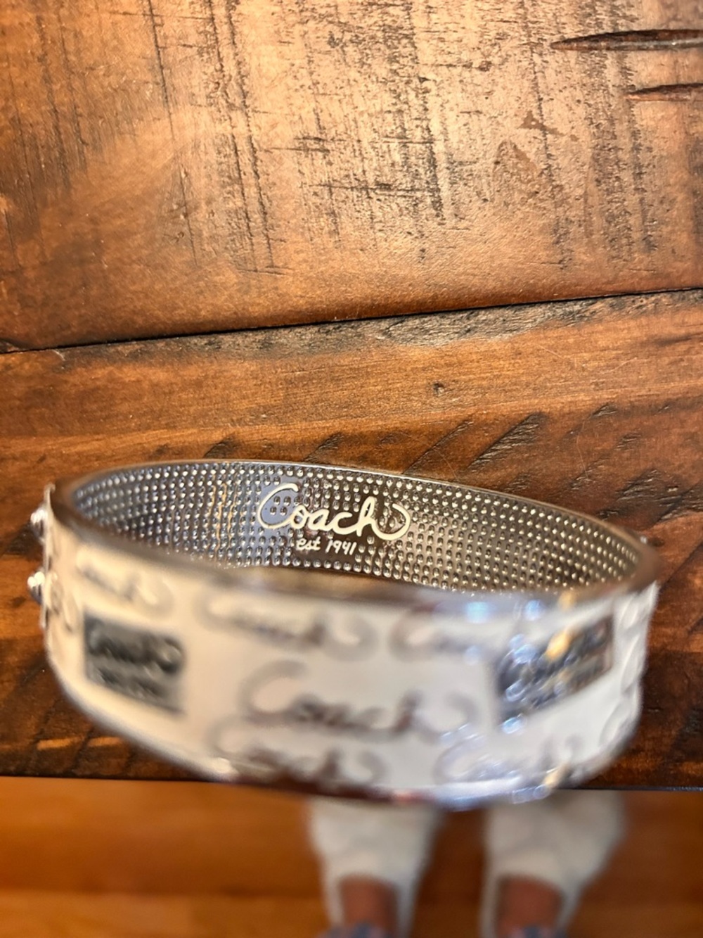 Coach Silver-Tone Signature Script Hinged Bangle - Picture 3 of 7